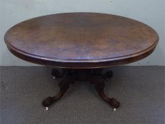 An Antique Walnut and Mahogany Oval Tilt-top Breakfast Table