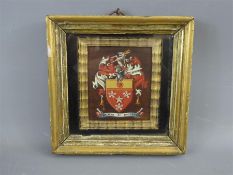 A Wood Painted Coat of Arms