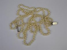 A Vintage Three-Strand Graduated Cultured Pearl Necklace