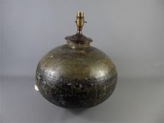 A Vintage Indian Hand-Beaten Metal Water Carrier