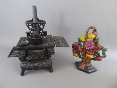 A Cast Iron Miniature Stove Door Stop