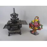 A Cast Iron Miniature Stove Door Stop