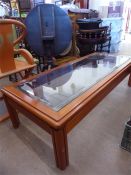 A Chinese Mid-20th Century Teak and Glass Coffee Table