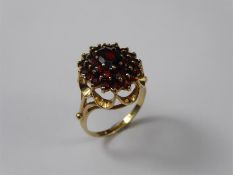 A Lady's Gold and Garnet Ring