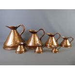 A Set of Seven Victorian Graduating Copper Haystack Measure Jugs