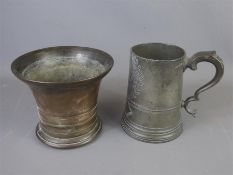 An Antique Pewter Tankard