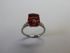 A 3.48 ct Natural Blush Red Spinel and Diamond Ring