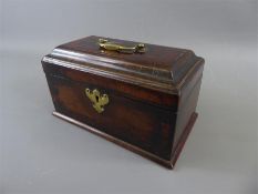 A Georgian Mahogany and Oak Tea Caddy