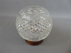 A Cut-glass Globe Vase on Wooden Stand