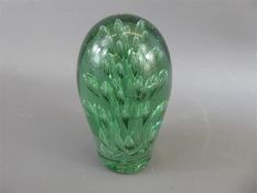 A Victorian Green Glass Dump Paperweight