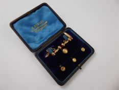 A Gentleman's Pair of 9 ct Gold Lozenge Cuff-links and Dress Studs