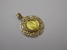 A Greek Coin Pendant, in 14 ct gold mount.