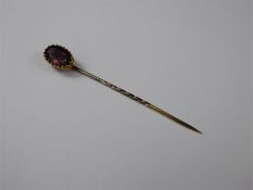 A Gentleman's Antique 14/15 ct Yellow Gold and Oval Garnet Tie Pin