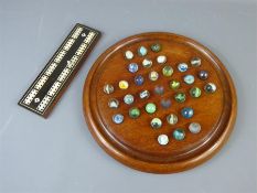 A 19th Century Mother of Pearl Cribbage Board