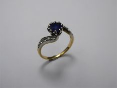 An Antique 18ct Yellow Gold and Platinum Sapphire and Diamond Ring