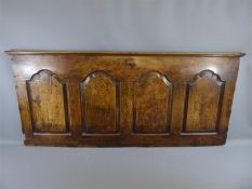 An Antique Panel Front of a Blanket Box