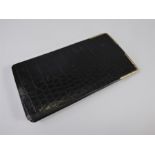 A Harrods Crocodile and Gold Plated Cigar Wallet