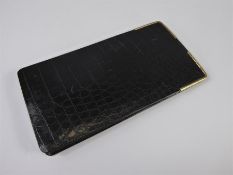 A Harrods Crocodile and Gold Plated Cigar Wallet