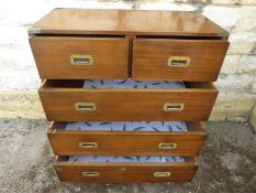 A Campaign-Style Chest of Drawers