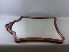 A Victorian Serpentine Mahogany Framed Hall Mirror