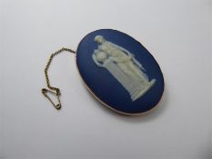 An Antique Oval Blue Porcelain Wedgwood Brooch