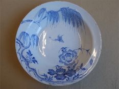 An Early 18th Century English Delftware Blue and White Deep Dish