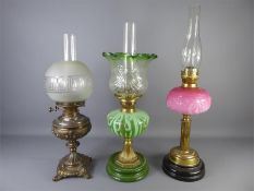 Three Late Victorian Cut-glass Oil Lamps