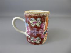 An Antique Chinese Famille Rose Mug