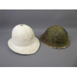 A Royal Marines Pith Helmet and Cover