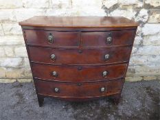 An Antique Bow-fronted Mahogany Chest of Drawers