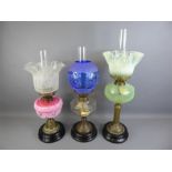 Three Late Victorian Cut-glass Oil Lamps