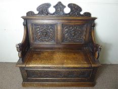 An Antique Carved Oak Settle