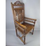 A Late 19th Century French Brittany Walnut Arm Chair