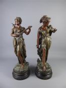 A Pair of Bronzed Classical Figurines