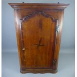 An Antique Mahogany Corner Cupboard