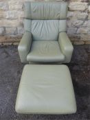 A Vintage G-Plan Leather Armchair and Footstool