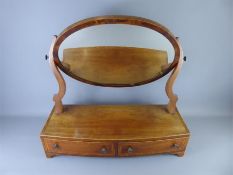 An Edwardian Oval Vanity Mirror