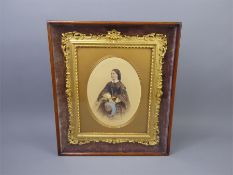 A Photograph of a Victorian Lady set Within a Mahogany Easel Frame.