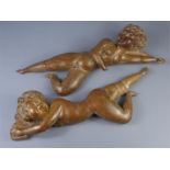 A Pair of Decorative Antique Hand-Carved Figurative Wall Sculptures