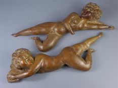 A Pair of Decorative Antique Hand-Carved Figurative Wall Sculptures