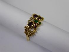 An 18ct Yellow Gold Ruby, Emerald and Diamond Ring