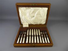 A Set of Mother of Pearl Handled Fruit Knives and Forks