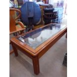 A Chinese Mid-20th Century Teak and Glass Coffee Table