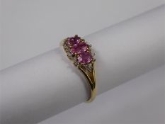 A 9ct Yellow Gold Pink Sapphire and Diamond Ring