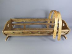 An Antique French Wooden Cradle