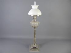 A Silver Plated Oil Lamp