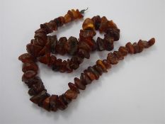 An Antique Unpolished Amber Graduated Necklace