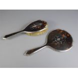 A Tortoise Shell and Silver Vanity Set