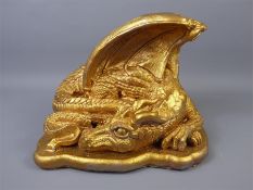 A Gilt Painted Crouching Dragon