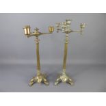 A Pair of Antique Tapered Brass Column Candlesticks